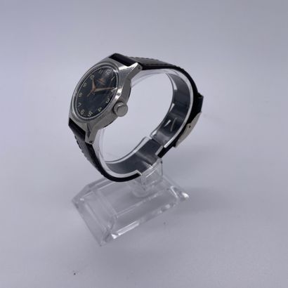 null MIDO MULTIFORT. CIRCA 1950. Steel bracelet watch, Swiss case. Black dial. Painted...