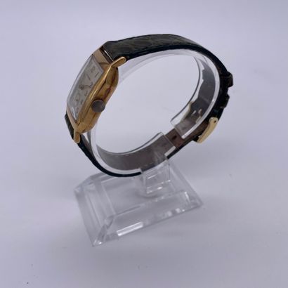 null TIFFANY & CO VERS 1950. Montre bracelet en or jaune 585/1000, 14K. Boîtier rectangulaire....