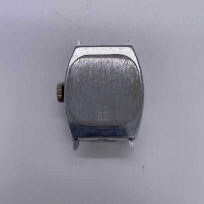 null INGERSOLL MICKEY CIRCA 1930. Steel watch, barrel case. Dial representing Mickey,...