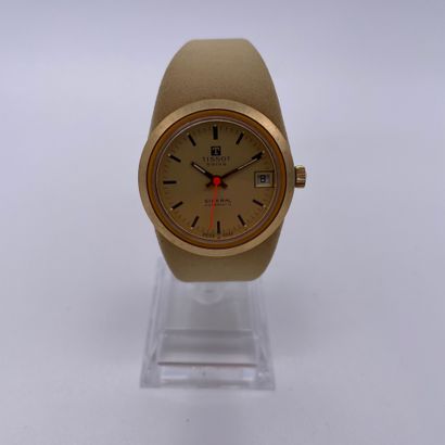 null SIDERAL WEAVE. CIRCA 1970. Steel and fiberglass wristwatch. Gold coloured dial....