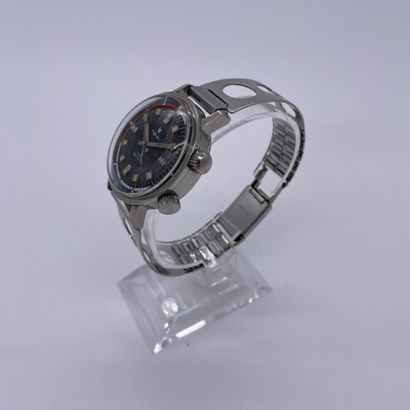 null LIP NAUTIC-SKI. CIRCA 1970. Steel wristwatch, round case, black and blue dial...