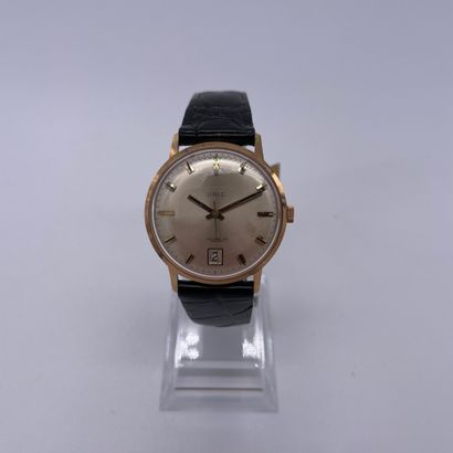 null UNIC AROUND 1960. Ref: 5821/60. Yellow gold bracelet watch 750/1000. White dial...