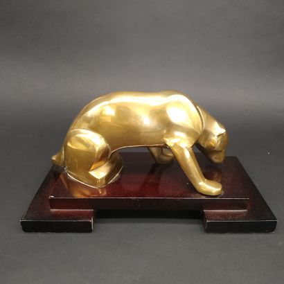 null PANTHER IN GILDED BRONZE

on a lacquered wood base 

Modern work 



H : 17...