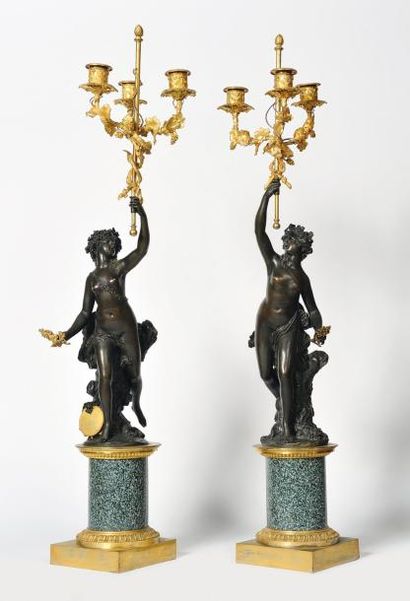 SAINT-LEU Rare paire de candélabres en bronze finement ciselé, patiné et doré à quatre...