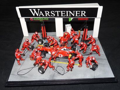FERRARI Diorama au 1/43e représentant Michael Schumacher et sa Formule 1 en plein...