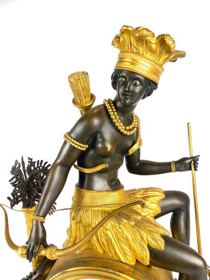 null Clock "l'Amérique" in patinated bronze and gilt bronze representing an Indian...
