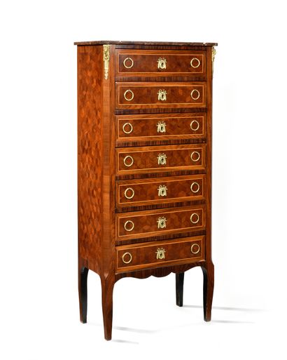 Wooden veneer and amaranth cabinet. It has...
