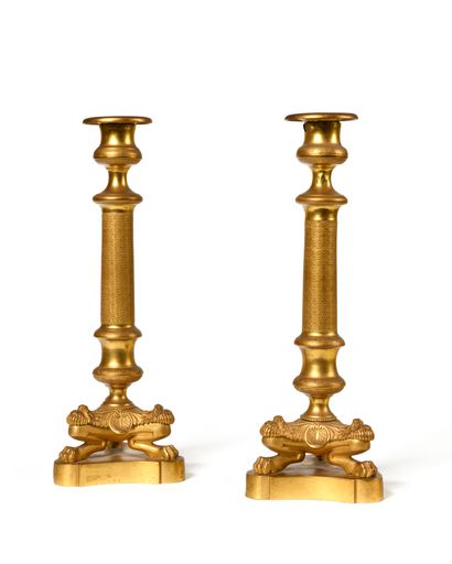 Pair of gilt bronze corkscrews, the tapered...
