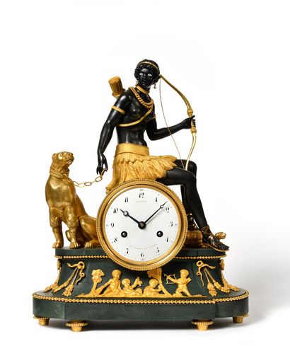  Gilt bronze and green patinated bronze "L'Afrique" clock representing a hunteress...