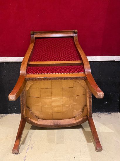 null A mahogany, mahogany veneer and patinated wood overturned back armchair, the...