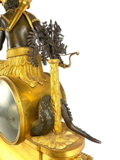  Clock "l'Amérique" in patinated bronze and gilt bronze representing an Indian woman...