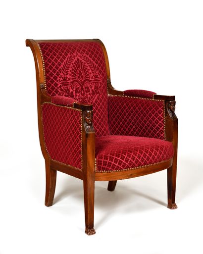 null A mahogany, mahogany veneer and patinated wood overturned back armchair, the...