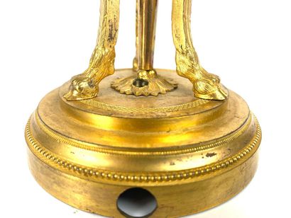 null CASSOLET forming an ormolu CANDLE, the uprights with women's heads ending in...