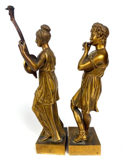 null Pair of gilt bronze SUBJECTS The couple musicians Early 19th century H : 22...