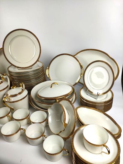 null LIMOGES Part of a white and gold porcelain table service model "Unic" including:...