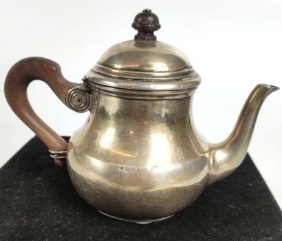 null Small silver teapot, the handle in rosewood. Marked Minerve Master goldsmith...