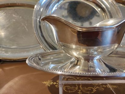 null CHRISTOFLE Set in silver plated metal including an oval dish, two round dishes...