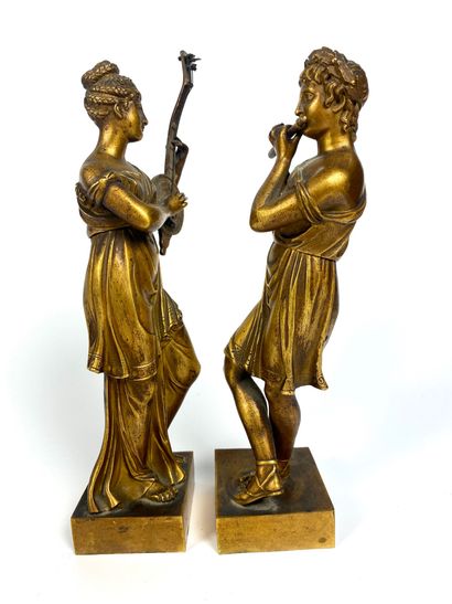 null Pair of gilt bronze SUBJECTS The couple musicians Early 19th century H : 22...