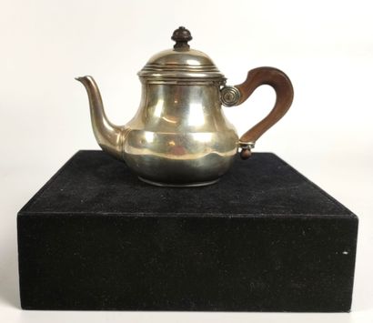 null Small silver teapot, the handle in rosewood. Marked Minerve Master goldsmith...