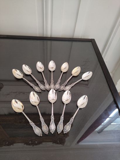 null TWELVE COFFEE SPOONERS in silver chased with foliage. Marked 800 Weight : 290...
