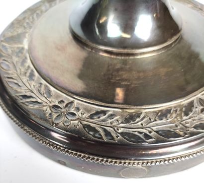 null PAIR OF silver FLAMPS the round base decorated with laurel leaves, monogrammed...