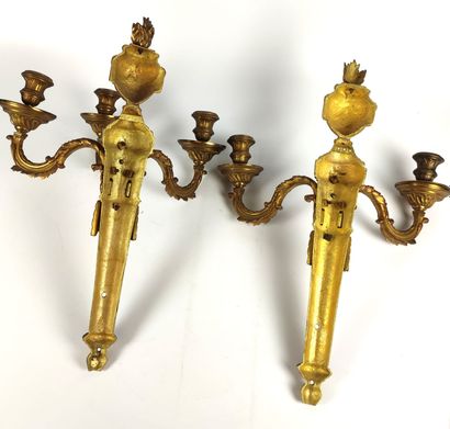 null Pair of gilt and chased bonze sconces with three arms, the shaft with flutes...
