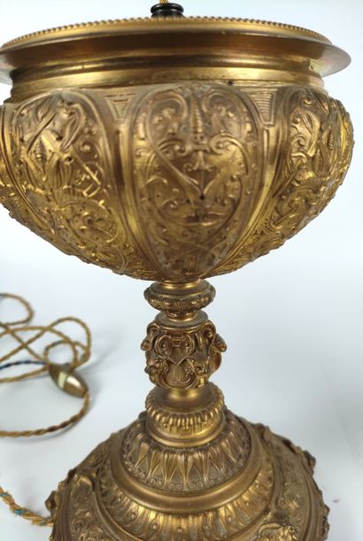 null A PAIR OF LAMPS on a gilt bronze pedestal with neo-gothic motifs. End of the...