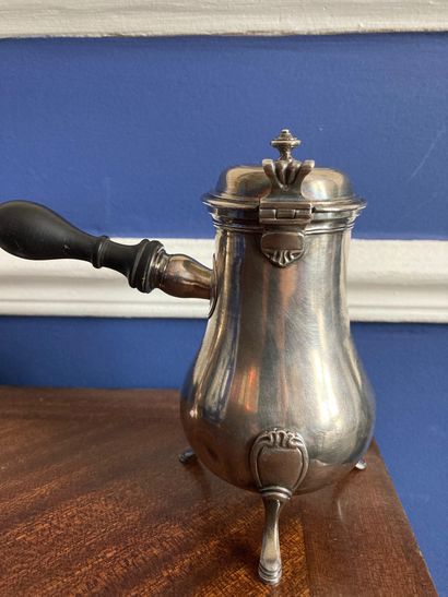  Silver VERSEUSE with tripod base and ebony side handle. The spout chased with flutes....