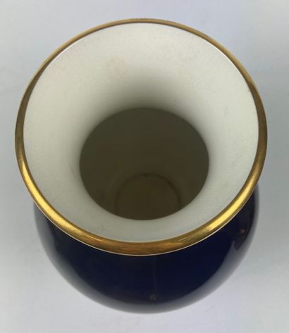 null SEVRES Blue porcelain baluster vase of furnace with gold liserets and with decoration...