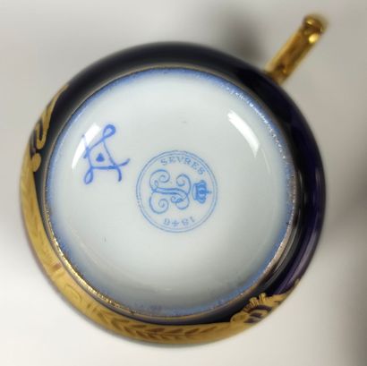 null SEVRES Service called "tête à tête" in blue and gold porcelain with polychrome...