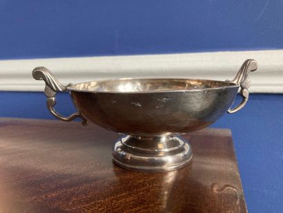 A silver WEDDING CUP standing on a moulded...