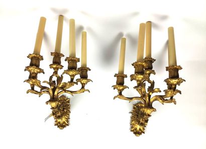Pair of ormolu and chased sconces with foliage...