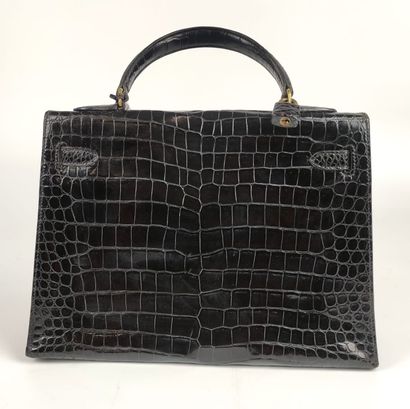  HERMES PARIS 'KELLY' handbag 32 cm in Singapore black crocodile (Crocodylus porosus)...