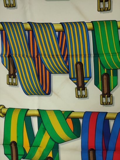 null HERMES Silk scarf with colored straps decoration. Box. Stains.