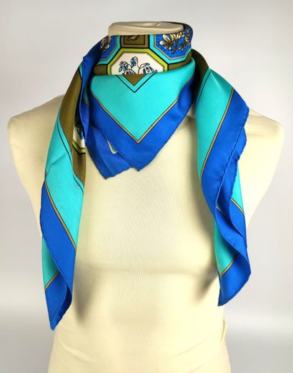 null HERMES Turquoise and blue silk scarf on a khaki background decorated with octagons...