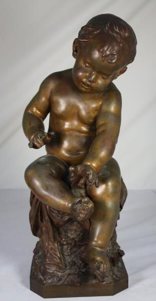 AUGUSTE MOREAU (1834 - 1917) Enfant à la mouche assis sur un rocher drapé et fleuri....