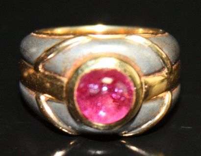 null ARFAN Bague or jaune et acier ornée d'une tourmaline de taille cabochon. Poids...