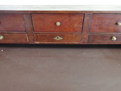 null Mahogany veneer stepped desk opening with two drawers in the belt and 6 drawers...