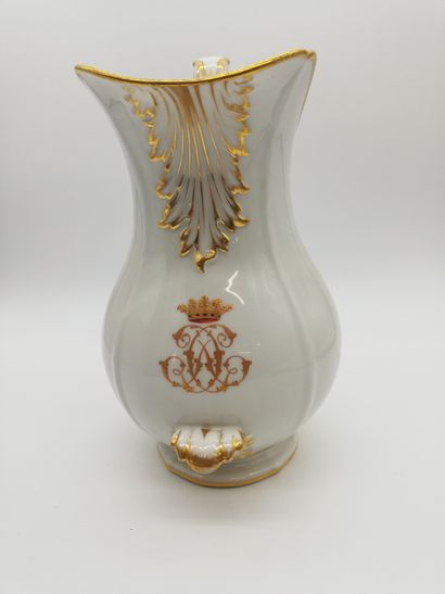 null IMPORTANT GOLDEN AND WHITE PORCELAIN GLASS with crowned initials decoration...