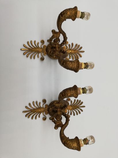 Pair of gilded bronze wall lights with two...