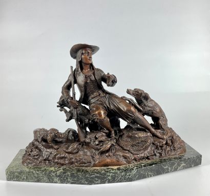 null After Jules MOIGNIEZ (1835-1894) Hunter and his dogs at rest Brown patina bronze...