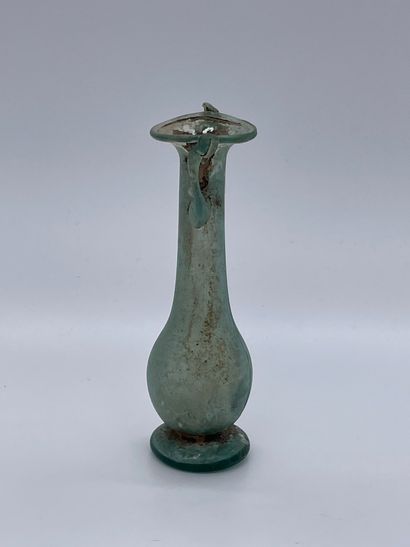 null Balsamaire with two handles, ovoid body on a projecting discoid foot. Bluish...