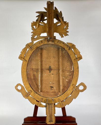 null Gilded wood BAROMETER with circular view and decoration on the pediment of a...