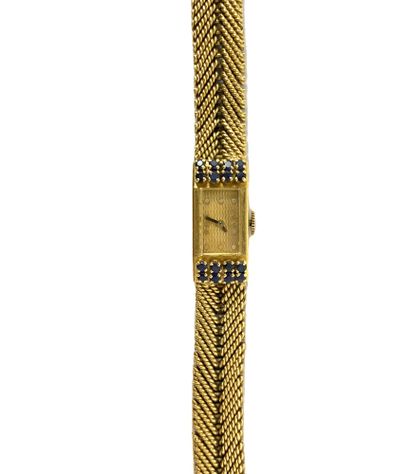 null BOUCHERON WATCH with a rectangular dial decorated with two lines of sapphires...
