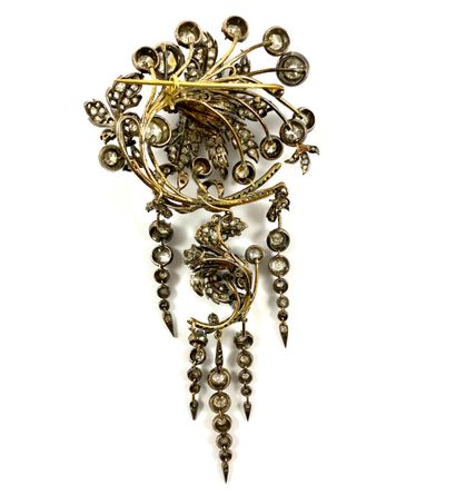 null 
19th CENTURY

IMPORTANT BROOCH

holding a flower entirely paved with old and...