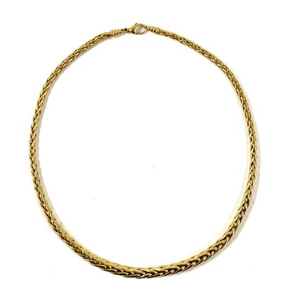 null NECKLACE adorned with a herringbone link. Mounting in 18K yellow gold. French...