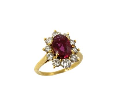 null POMPADOUR RING holding a ruby of about 1.50 carats in a circle of brilliant-cut...