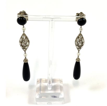 PAIR OF EARRINGS composed of a cabochon onyx...