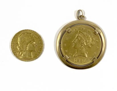 null Coins - An American coin of 1880 in pendant. - A French Republic 20 Francs coin....