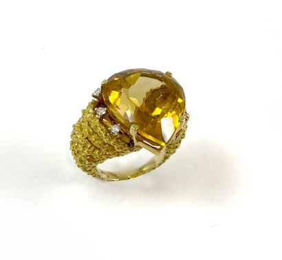 null H. STERN RING adorned with a 28.75-carat pear-shaped citrine set with six brilliant-cut...